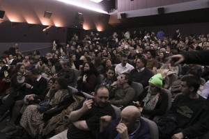 Crowd applaud after the projection of the film "President"